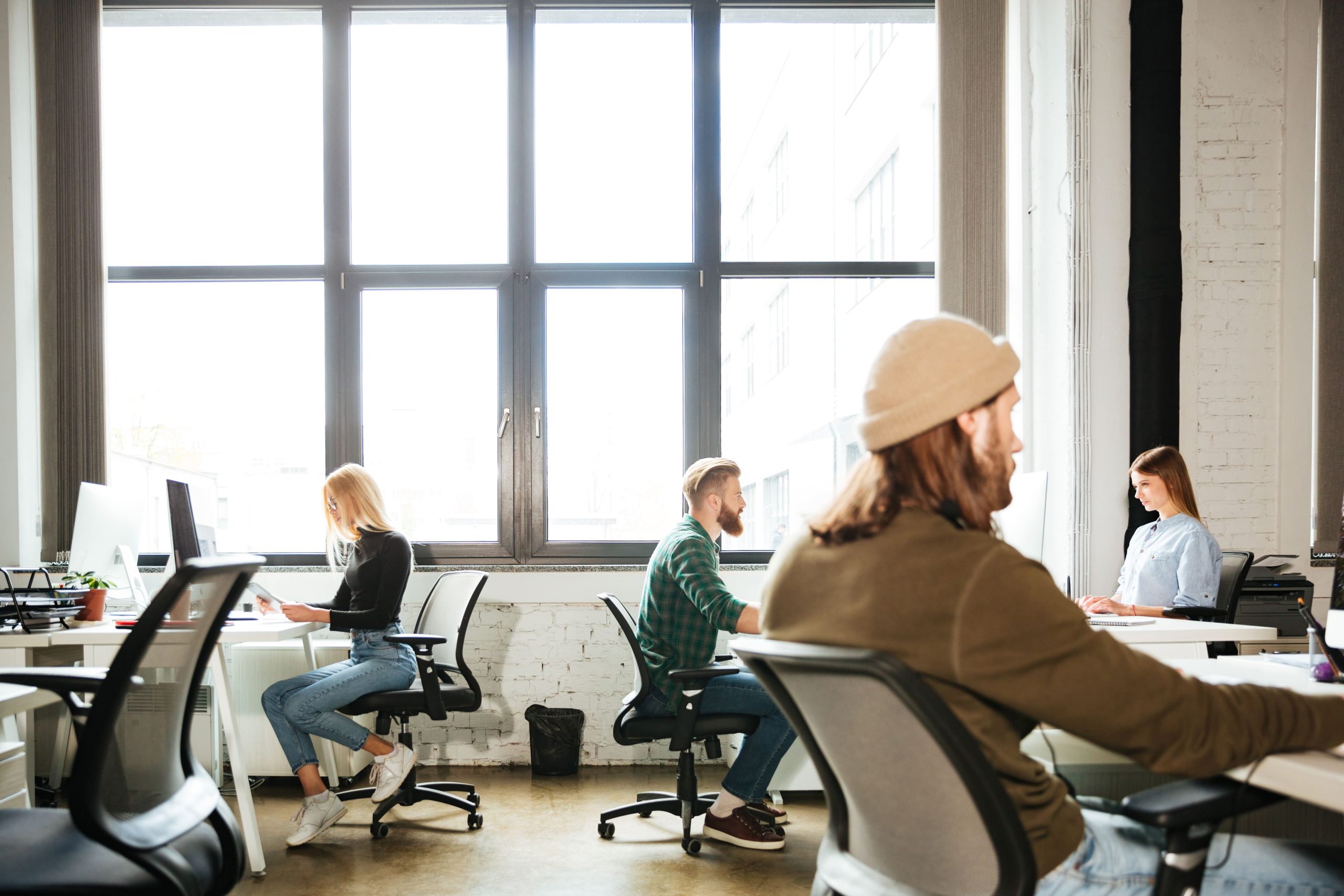 VISION adjustable office furniture executive chair in collaborative workspace
