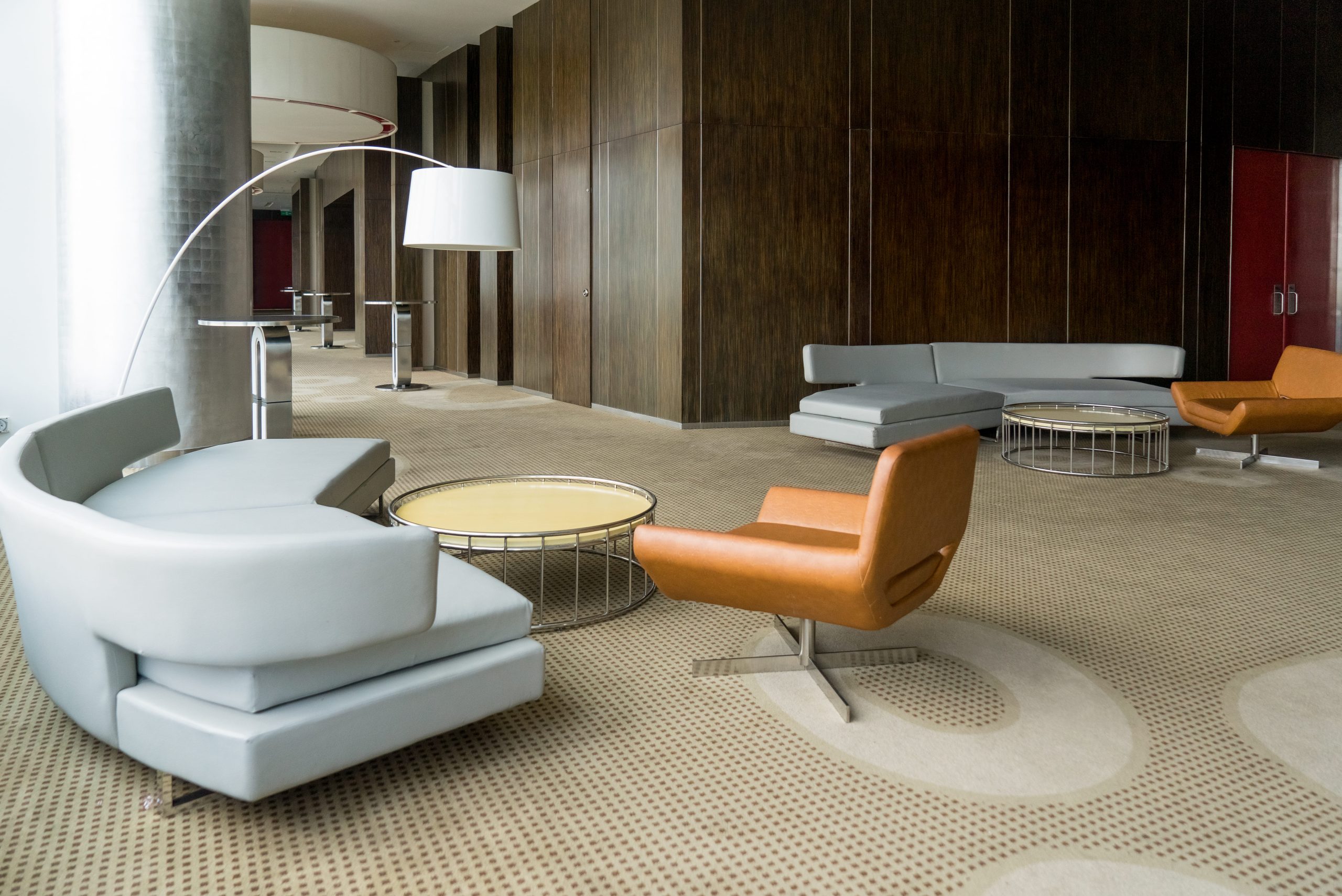 leather office sofa furniture in a modern reception area with matching desk