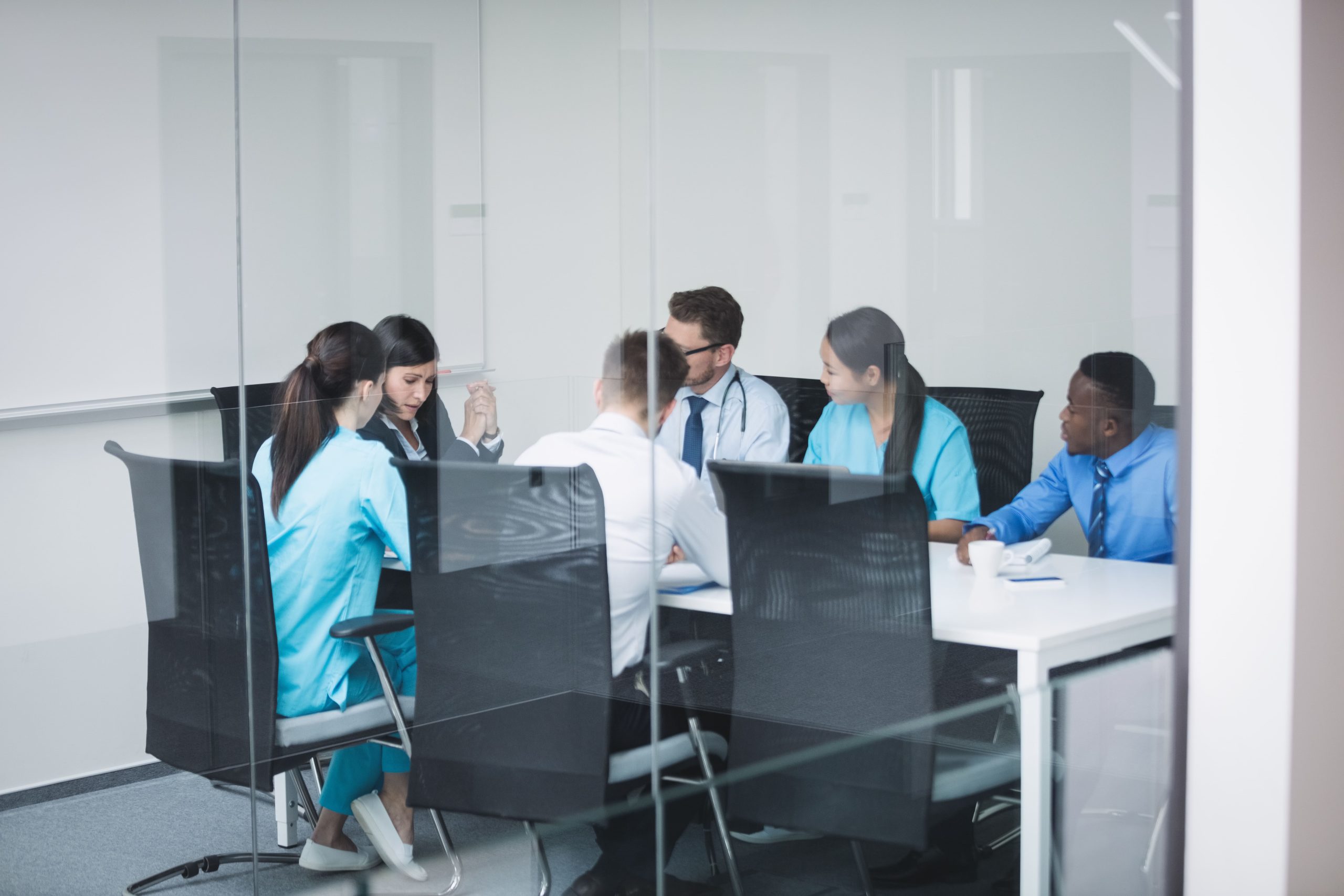 Easy-to-clean commercial office desks for healthcare administration—ergonomic medical office workstations